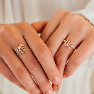 Golden rings shown on both hands from O. Live Love.